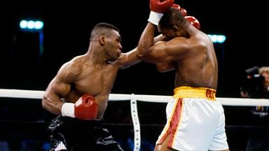 Mike Tyson (black trunks) battles Donovan Ruddock (white trunks) during their heavyweight fight at The Mirage. Tyson defeated Ruddock by TKO in round 7.