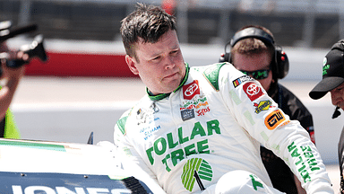 NASCAR Cup Series driver Erik Jones (43) climbs from his car during qualifying for the Cook Out Southern 500 at Darlington Raceway.