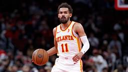 Atlanta Hawks guard Trae Young (11) brings the ball up court against the Chicago Bulls during the second half at United Center