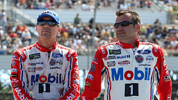 NASCAR Cup Series driver Kevin Harvick (left) sits on the pit wall with crew chief Rodney Childers (right) prior to the Overton's 400 at Pocono Raceway.