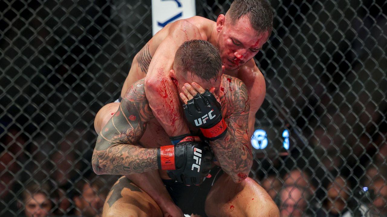 Dustin Poirier (red gloves) and Michael Chandler (blue gloves) during UFC 281 at Madison Square Garden.