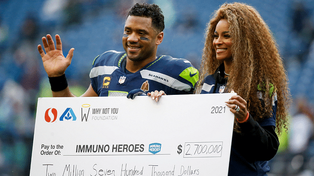 Seattle Seahawks quarterback Russell Wilson (3) and wife Ciara