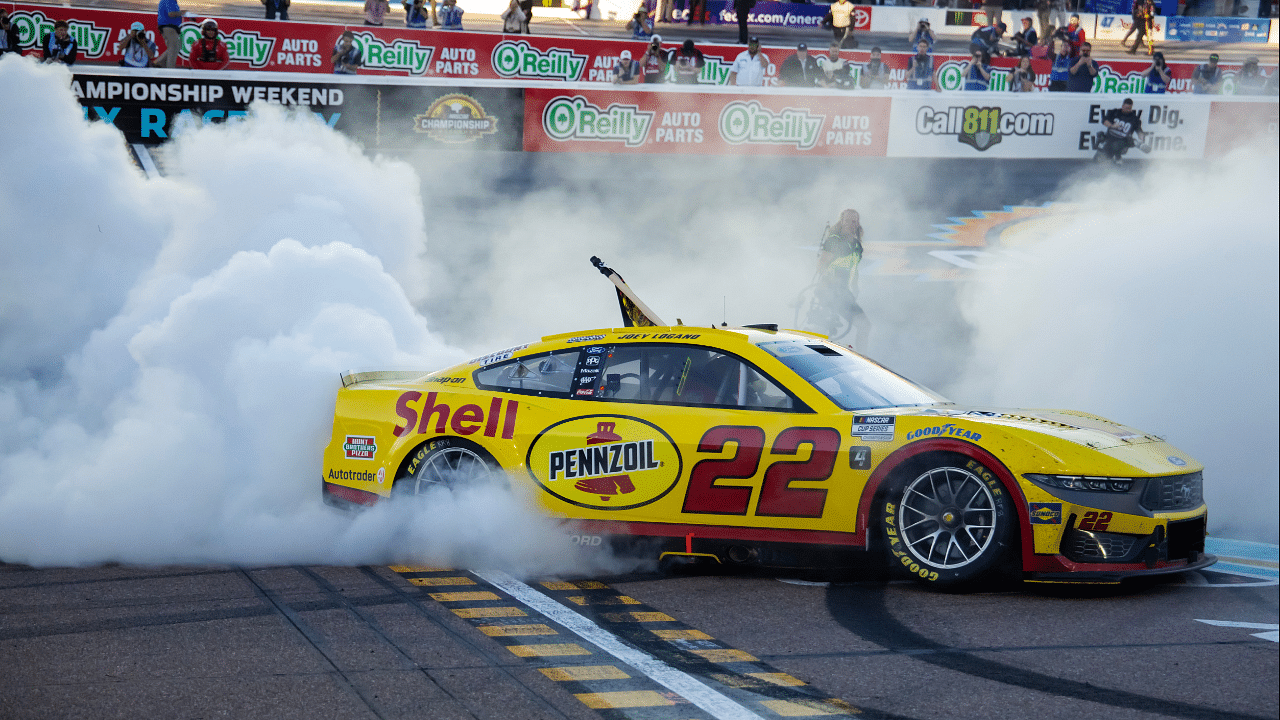 NASCAR Cup Series driver Joey Logano (22) celebrates after winning the 2024 NASCAR Cup Series championship and the NASCAR Cup Series Championship race at Phoenix Raceway.