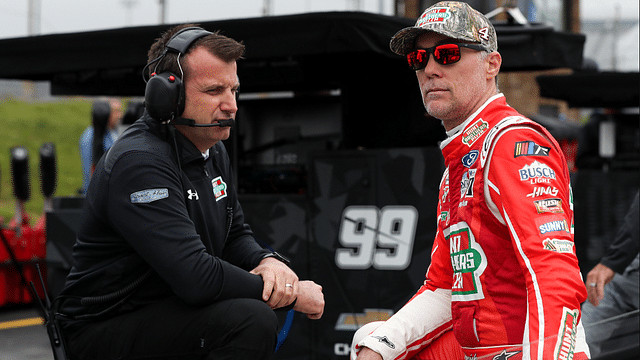 Apr 29, 2023; Dover, Delaware, USA; NASCAR Cup Series driver Kevin Harvick (right) talks with his crew chief Rodney Childers (left) on pit road during practice and qualifying for the Wurth 400 at Dover Motor Speedway. Mandatory Credit: Matthew OHaren-Imagn Images