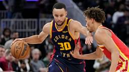 Golden State Warriors guard Stephen Curry (30) dribbles the basketball against Atlanta Hawks guard Dyson Daniels (5) during the fourth quarter at Chase Center.