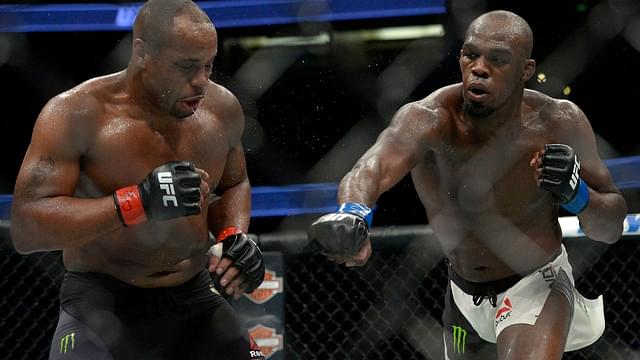 Jon Jones lands a hit against Daniel Cormier during UFC 214 at Honda Center.