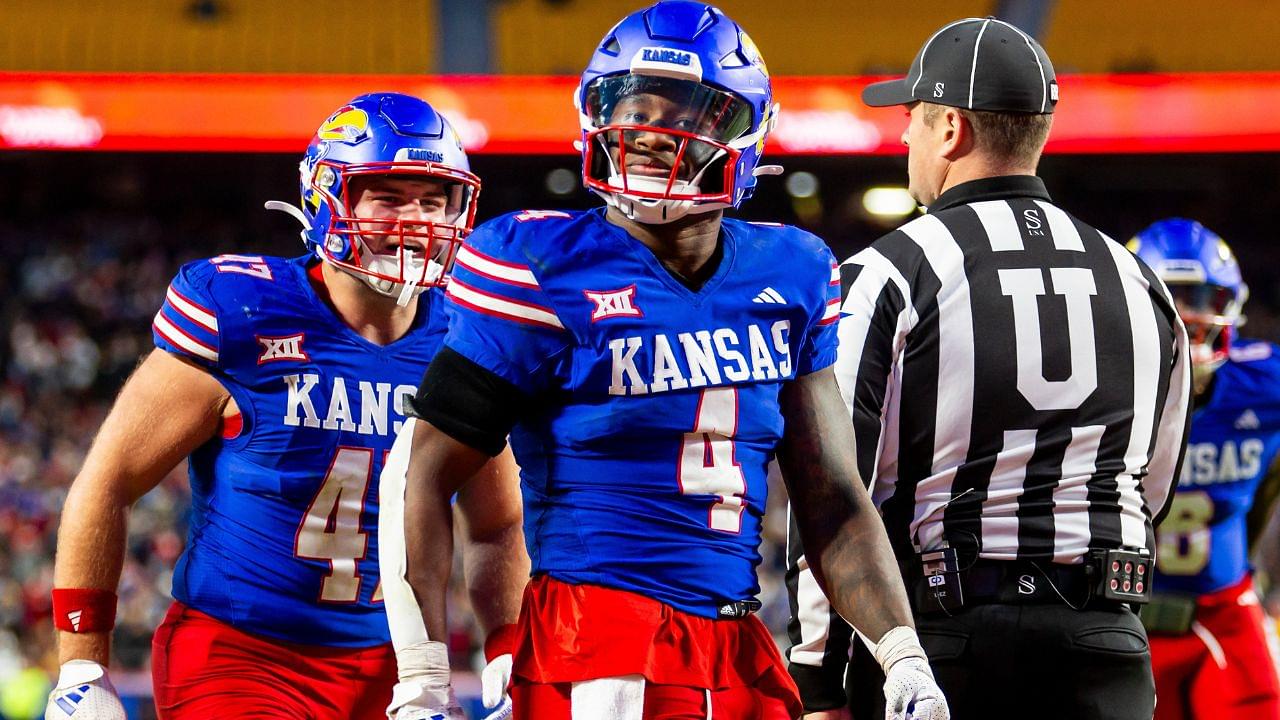 Kansas running back Devin Neal (4) reacts after scoring a touchdown during the 3rd quarter between the Kansas Jayhawks and the Colorado Buffaloes at GEHA Field at Arrowhead Stadium.