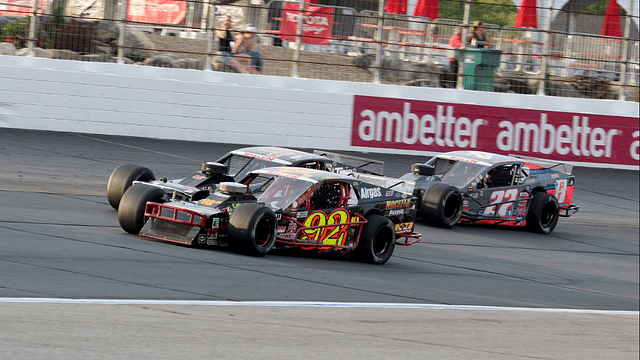 Anthony Nocella ( 92 Nocella Paving K+D Associates, Air Gas Modified), Eric Goodale ( 58 GAF Roofing Modified), and Kyle Bonsignore ( 22 Chalew Performance MTT Muns Auto Modified) in turn 4 during the NASCAR, Motorsport, USA Whelen Modified Tour Whelen Manufactured in America 100 race on July 16, 2022 at the New Hampshire Motor Speedway in Loudon, New Hampshire.(Photo by Malcolm Hope Icon Sportswire) AUTO: JUL 16 NASCAR Whelen Modified Tour.