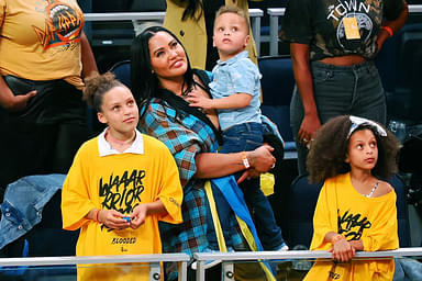 Ayesha Curry, wife of Golden State Warriors guard Stephen Curry (not pictured), with her children after winning game five of the 2022 western conference finals against the Dallas Mavericks at Chase Center.