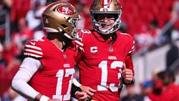 an Francisco 49ers quarterback Brock Purdy (13) smiles with quarterback Brandon Allen (17) before the game against the Cincinnati Bengals at Levi's Stadium.