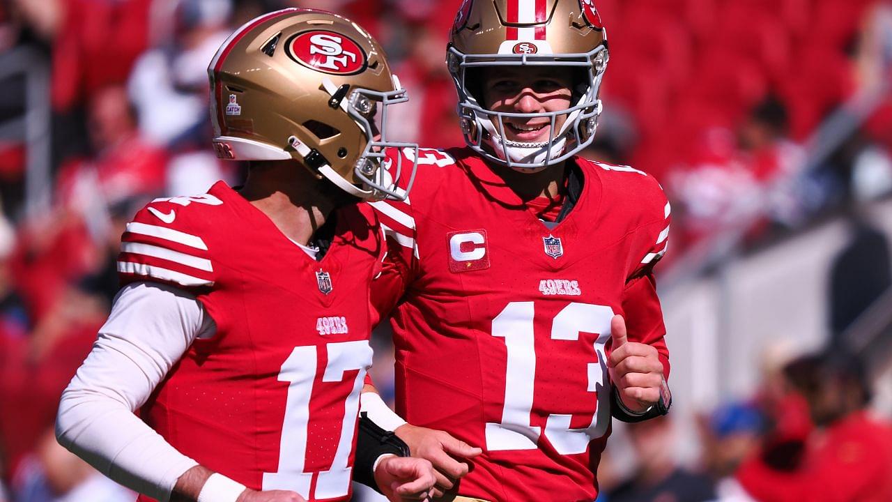 an Francisco 49ers quarterback Brock Purdy (13) smiles with quarterback Brandon Allen (17) before the game against the Cincinnati Bengals at Levi's Stadium.