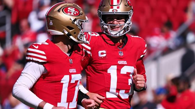 an Francisco 49ers quarterback Brock Purdy (13) smiles with quarterback Brandon Allen (17) before the game against the Cincinnati Bengals at Levi's Stadium.