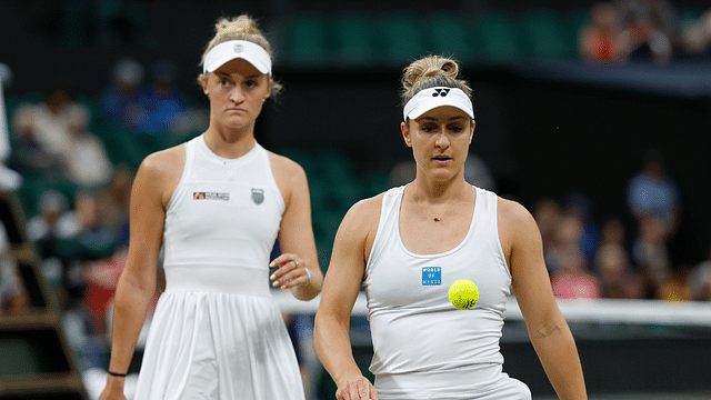 Gabriela Dabrowski (CAN)(R) and Erin Routliffe (NZL)(L) on court between points against Taylor Townsend (USA) and Katerina Siniakova (CZE)(both not pictured) in the ladies' doubles final of The Championships Wimbledon 2024