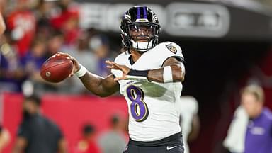 Baltimore Ravens quarterback Lamar Jackson (8) warms up before a game against the Tampa Bay Buccaneers at Raymond James Stadium.