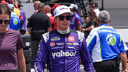 NASCAR Cup Series driver Christopher Bell (20) walks down pit road to see his winning pit crew after the crew challenge during qualifying at North Wilkesboro Speedway.