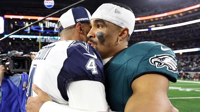 Dec 10, 2023; Arlington, Texas, USA; Dallas Cowboys quarterback Dak Prescott (4) hugs Philadelphia Eagles quarterback Jalen Hurts (1) after the game at AT&T Stadium.