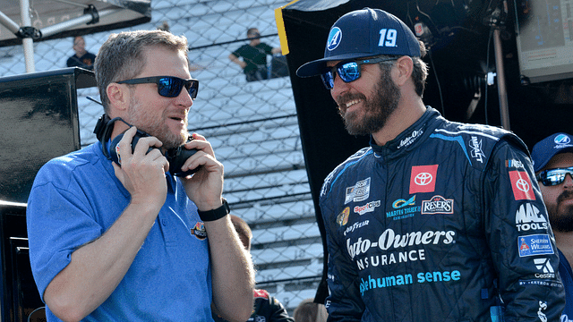 NASCAR Cup Series driver Martin Truex Jr. (19) talks with Dale Earnhardt Jr. on Saturday, July 30, 2022, during practice for the Verizon 200 at the Brickyard at Indianapolis Motor Speedway.