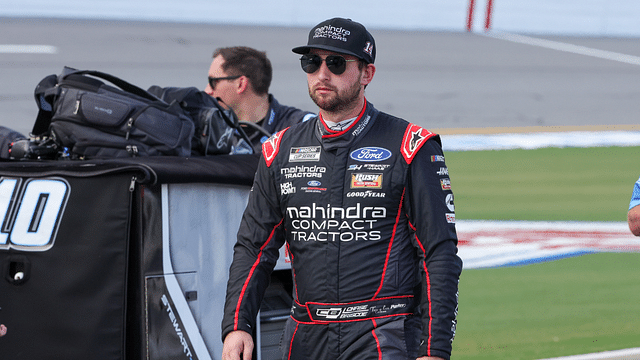 NASCAR Cup Series driver Chase Briscoe (14) walks to his car before qualifying for the Coke 400 at Daytona International Speedway