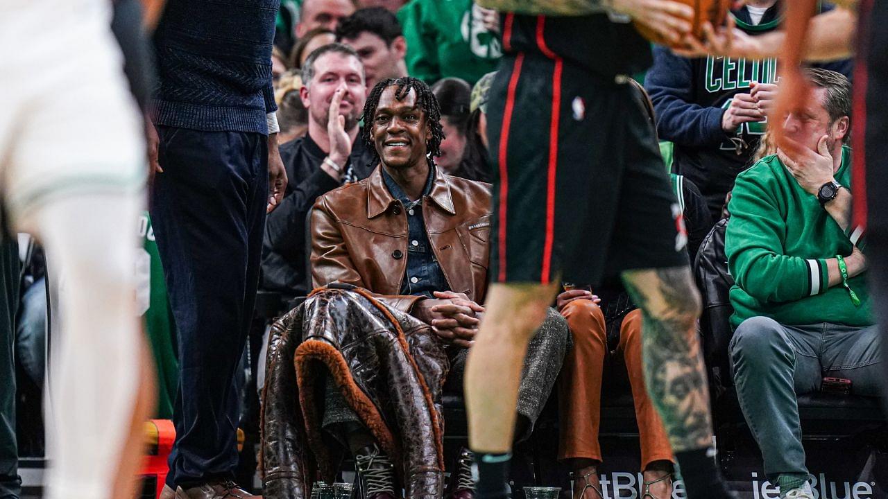 Former Boston Celtics player Rajon Rondo on the sideline as the Celtics take on the Detroit Pistons in the second half at TD Garden