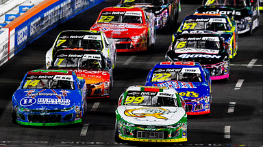 NASCAR Mexico Series drivers Daniel Suarez (99) and Alex de Alba (14) lead the field to the green flag during a NASCAR Mexico Series race at the Los Angeles Memorial Coliseum.