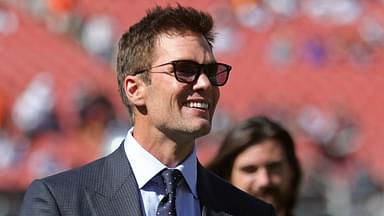 NFL legend Tom Brady is all smiles before an NFL football game at Huntington Bank Field, Sunday, Sept. 8, 2024, in Cleveland, Ohio.