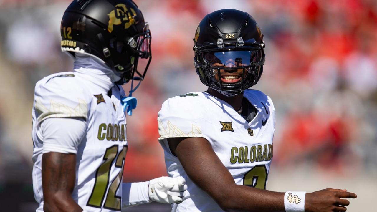 Oct 19, 2024; Tucson, Arizona, USA; Colorado Buffalos quarterback Shedeur Sanders (2) with wide receiver Travis Hunter (12) against the Arizona Wildcats at Arizona Stadium.