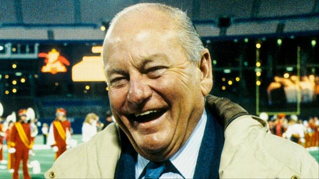 St. Louis Cardinals owner Bill Bidwill (left) talks with Dallas Cowboys general manager Tex Schramm (right) on the field at Busch Stadium