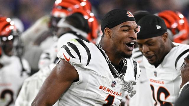 Cincinnati Bengals wide receiver Ja'Marr Chase (1) walks with a chain around his neck on the sidelines after scoring a touchdown during the second half against the Baltimore Ravens at M&T Bank Stadium.