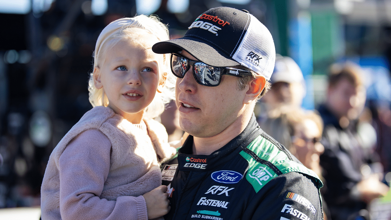 NASCAR Cup Series driver Brad Keselowski (6) with his daughter during the Daytona 500 at Daytona International Speedway.