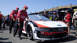 Pit crews for NASCAR Cup Series driver Harrison Burton (21) pushes out the race vehicle before the start of the Toyota / Save Mart 350 at Sonoma Raceway.