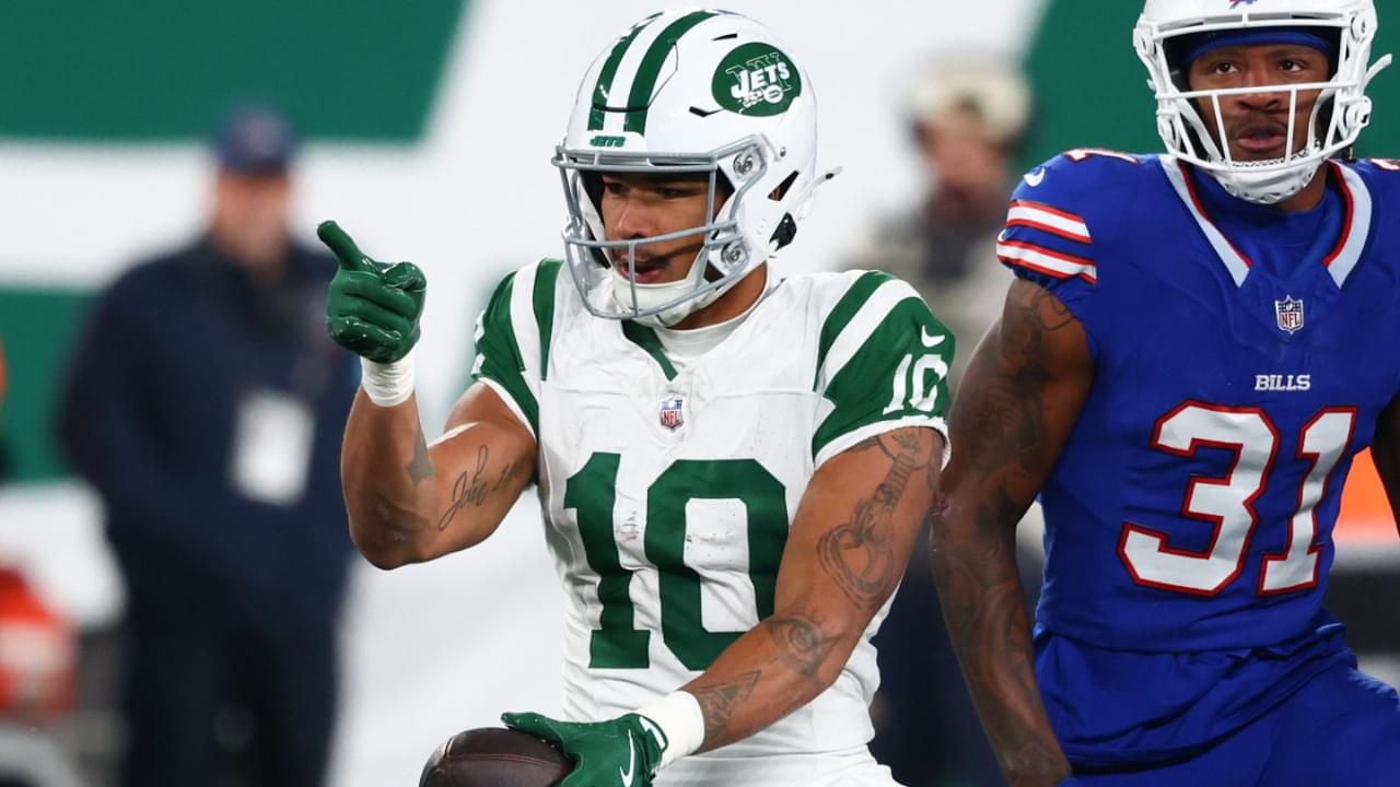 Oct 14, 2024; East Rutherford, New Jersey, USA; New York Jets wide receiver Allen Lazard (10) celebrates after making a first down catch during the first half of their game against the Buffalo Bills at MetLife Stadium.