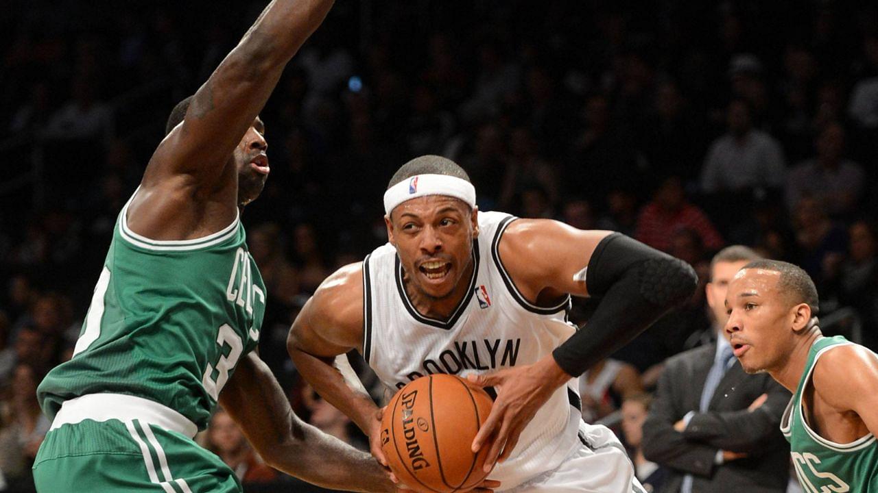 Paul Pierce (C) of Brooklyn Nets holds the ball during the 2013-2014 NBA Basketball Herren USA pre-season match against Boston Celtics in New York, the United States, Oct. 15, 2013. Brooklyn Nets won the match 82-80.