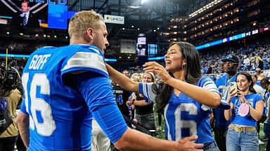 Detroit Lions quarterback Jared Goff hugs his wife Christen Harper during warmups before the Los Angeles Rams game at Ford Field in Detroit.