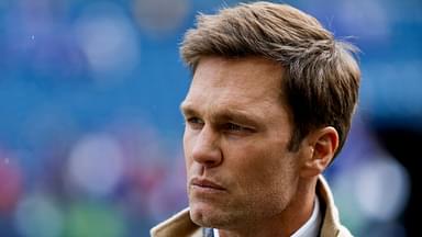 FOX commentator Tom Brady stands on the sideline before a game between the Seattle Seahawks and Buffalo Bills at Lumen Field.