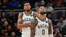 Milwaukee Bucks forward Giannis Antetokounmpo (34) and guard Damian Lillard (0) look on in the second quarter against the Chicago Bulls at Fiserv Forum.