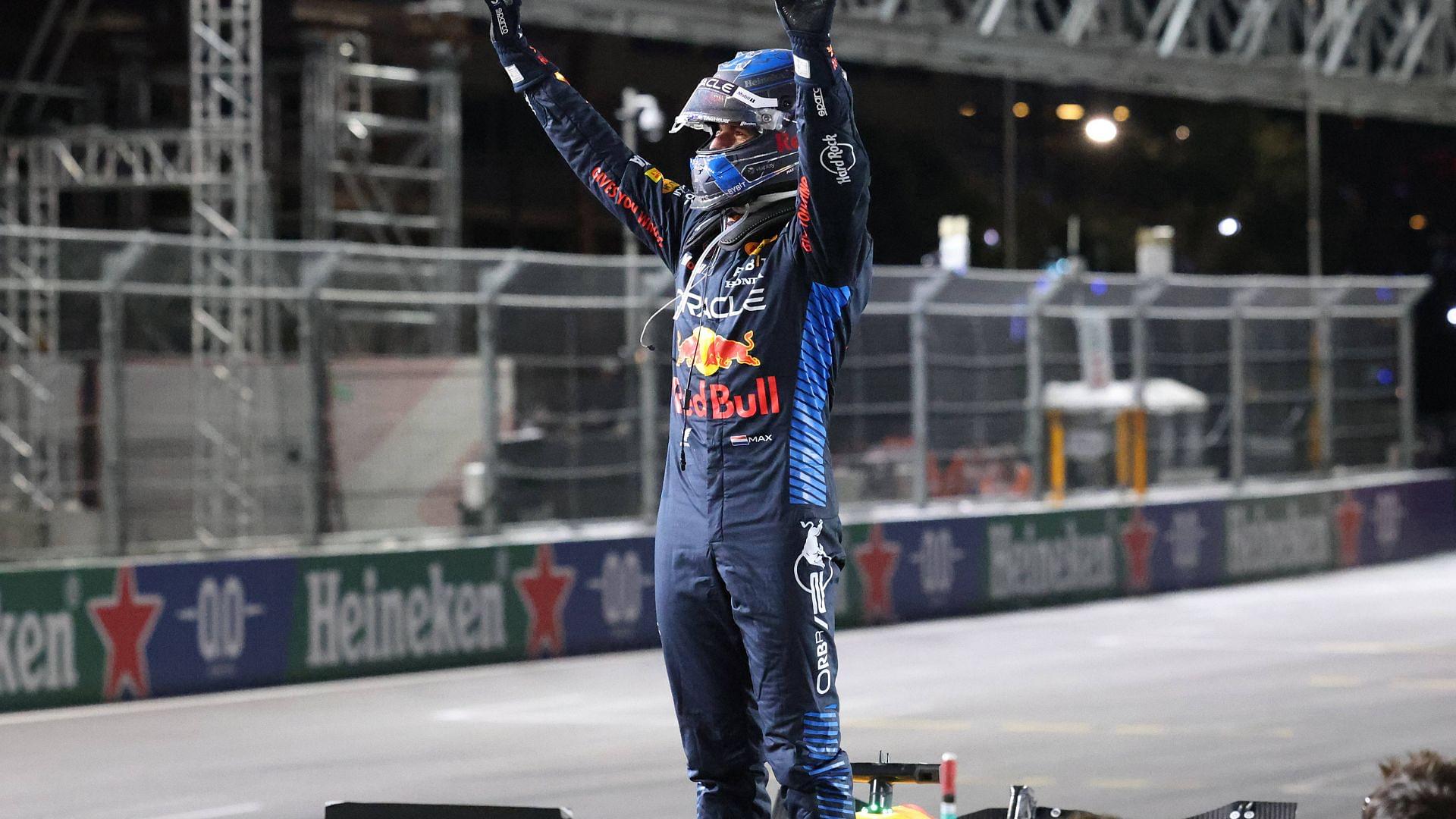 LAS VEGAS, NV - NOVEMBER 23: Max Verstappen (1) Oracle Red Bull Racing lifts his arms in the air after winning his fourth F1 world title at the Heineken Silver Las Vegas Grand Prix on Saturday, Nov. 23, 2024