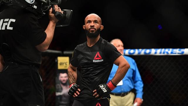 Demetrious Johnson (red) following the win over and Wilson Reis (not pictured) during UFC Fight Night at Sprint Center