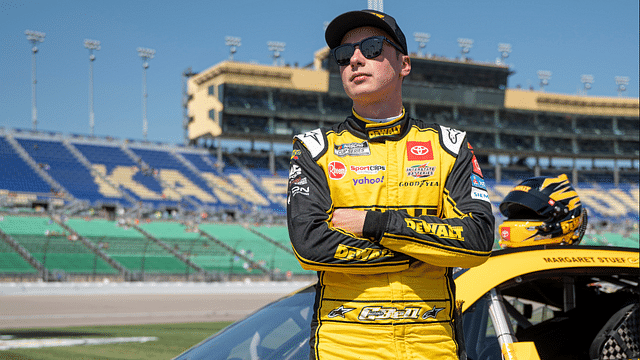 NASCAR Cup Series driver Christopher Bell (20) stands by his car before NASCAR Cup Qualifying at Kansas Speedway.