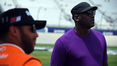 NASCAR Cup Series 23XI Racing owner Michael Jordan and driver Bubba Wallace (23) on pit road during qualifying for the Ally 400 at Nashville Superspeedway.