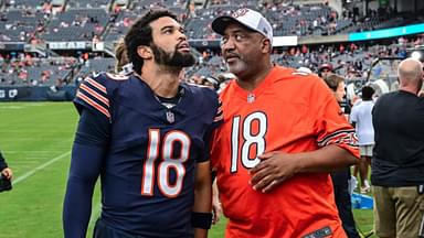 Aug 17, 2024; Chicago, Illinois, USA; Chicago Bears quarterback Caleb Williams (18) talks with his father Carl Williams before the game against the Cincinnati Bengals at Soldier Field.