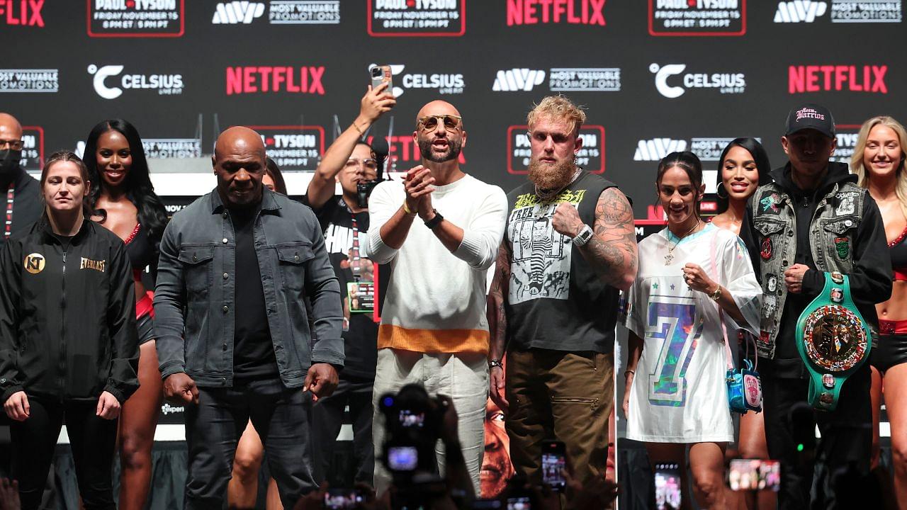 Jake Paul (right) faces off with Mike Tyson (left) during a press conference at The Pavilion at Toyota Music Factory.