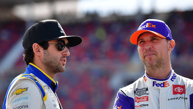 NASCAR Cup Series driver Chase Elliott (9) speaks with NASCAR Cup Series driver Denny Hamlin (11) during qualifying at Phoenix Raceway.