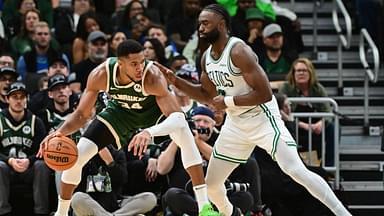 Milwaukee Bucks forward Giannis Antetokounmpo (34) is guarded by Boston Celtics forward Jaylen Brown (7) in the fourth quarter at Fiserv Forum.