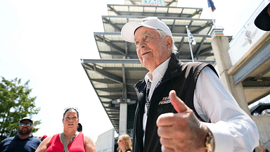 Roger Penske greets fans Saturday, July 20, 2024, during qualifying for the Brickyard 400 at Indianapolis Motor Speedway.