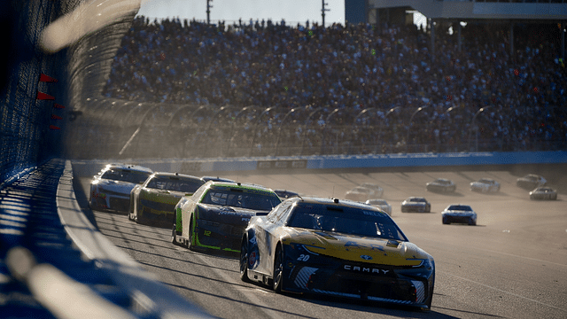 NASCAR Cup Series driver Christopher Bell (20) leads the restart during the Cup Series championship race at Phoenix Raceway.