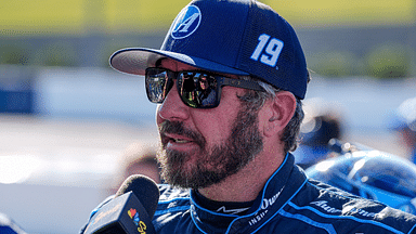 NASCAR Cup Series driver Martin Truex Jr. (19) talks with media after winning the pole during cup qualifying at Martinsville Speedway.