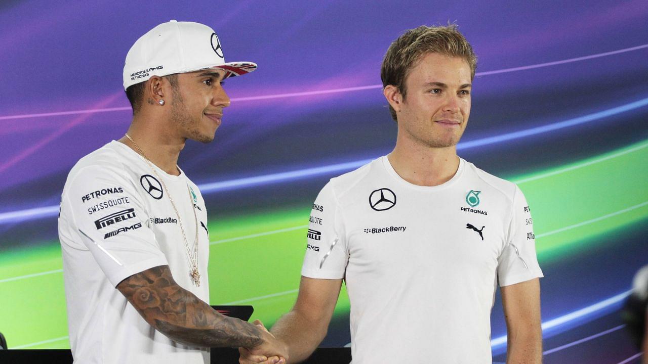 British Lewis Hamilton of Mercedes AMG Petronas F1 Team and German Nico Rosberg of Mercedes AMG Petronas F1 Team shakes hands at a press conference