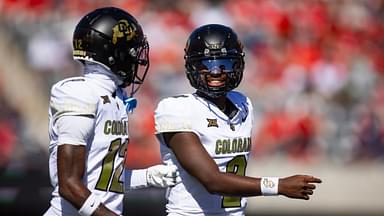 Colorado Buffalos quarterback Shedeur Sanders (2) with wide receiver Travis Hunter (12) against the Arizona Wildcats at Arizona Stadium.