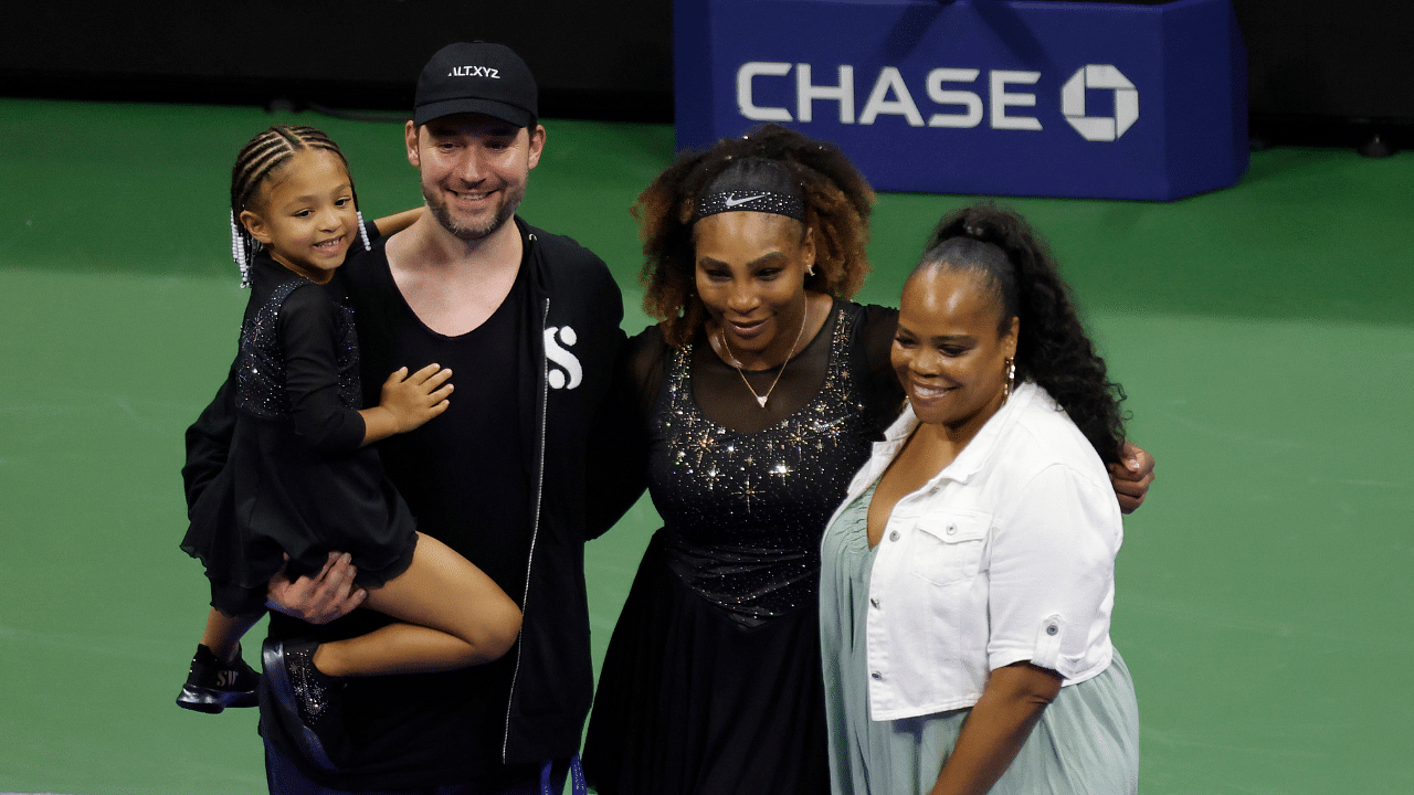 Serena Williams (USA) (M-R) poses for a picture with daughter Olympia (L), husband Alexis Ohanian (M-L), and sister Isha Price (R)