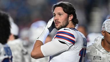 Buffalo Bills quarterback Josh Allen (17) stands on the sidelines before the game against the Indianapolis Colts at Lucas Oil Stadium.